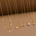 Elegant 5-Piece Necklace Combo – Gold-Tone Chain Set with Heart, Infinity & Star Charms