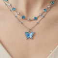 Blue Butterfly Pendant Necklace – Elegant Silver Chain with Shimmering Crystal Accents